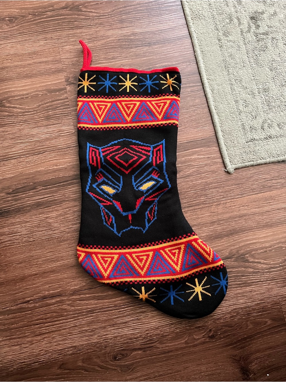 Black Holiday Stocking with Geometric Panther Design